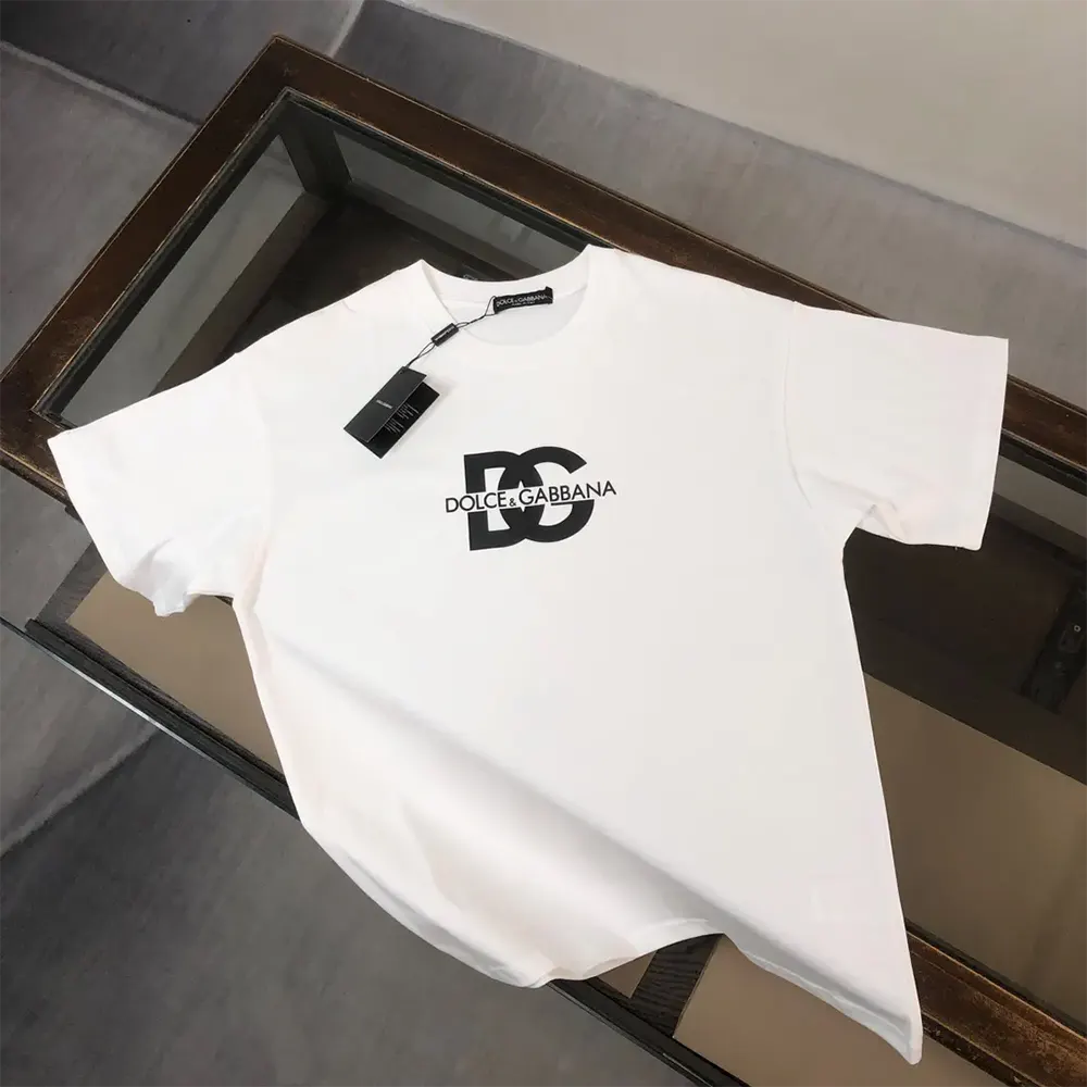 Close-up of bold DG logo on white Dolce Gabbana D&G Men T-shirt