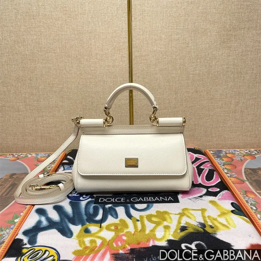 Close-up of gold-tone D&G hardware on Small Sicily Handbag in white leather
