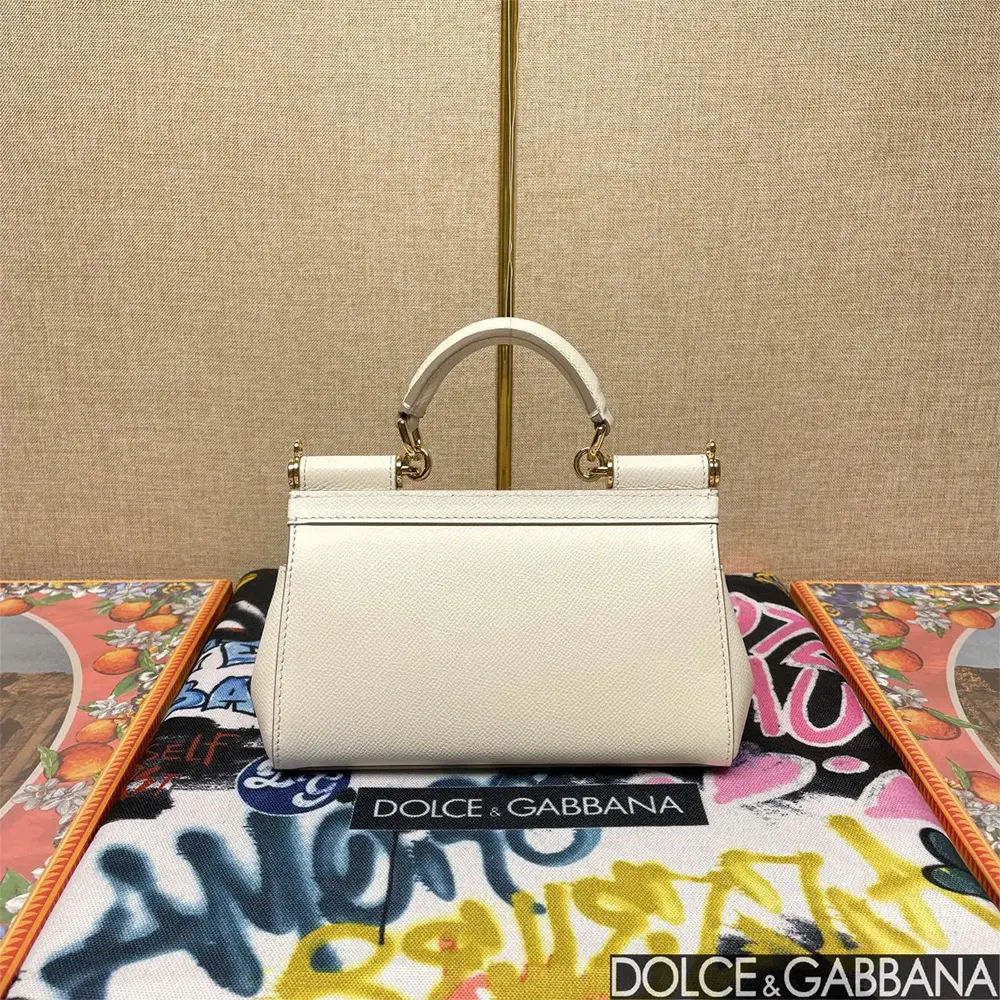 Side profile of structured white leather Dolce Gabbana D&G Small Sicily Handbag