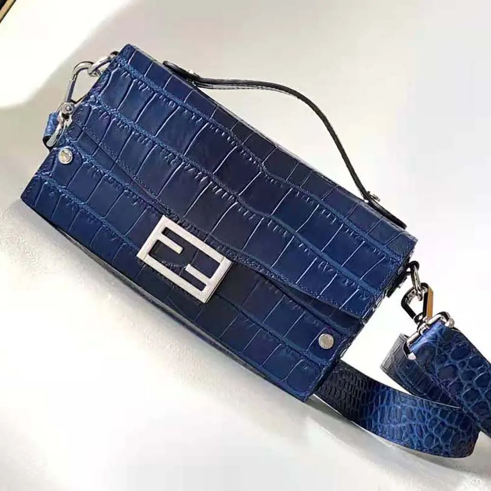 Close-up of silver hardware on Fendi Men Soft Trunk Baguette Blue Gradient Crocodile Bag