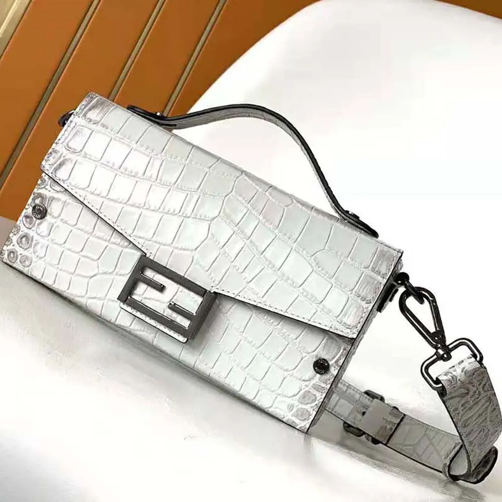 Close-up of silver hardware on Fendi Men Soft Trunk Baguette White Nuanced Crocodile Leather Bag
