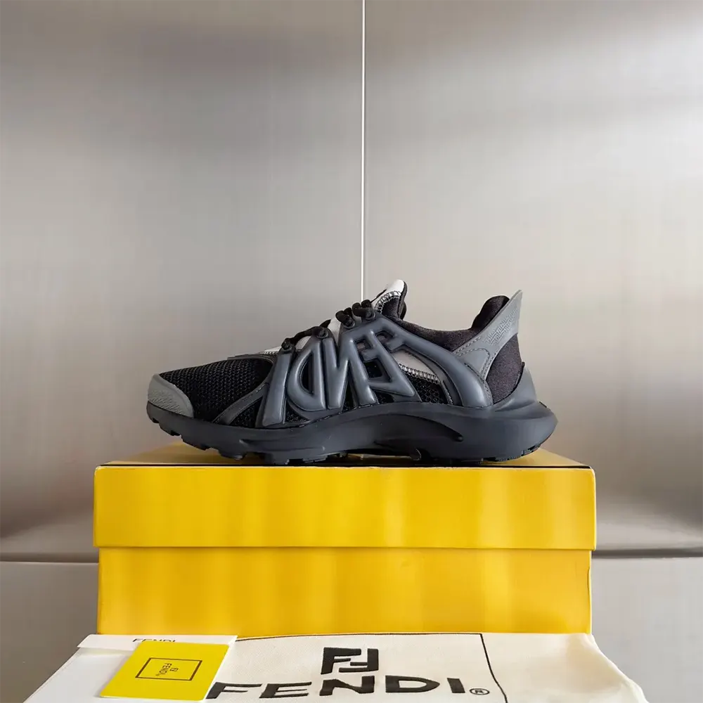 Close-up on black mesh upper and Fendi logo hardware detail