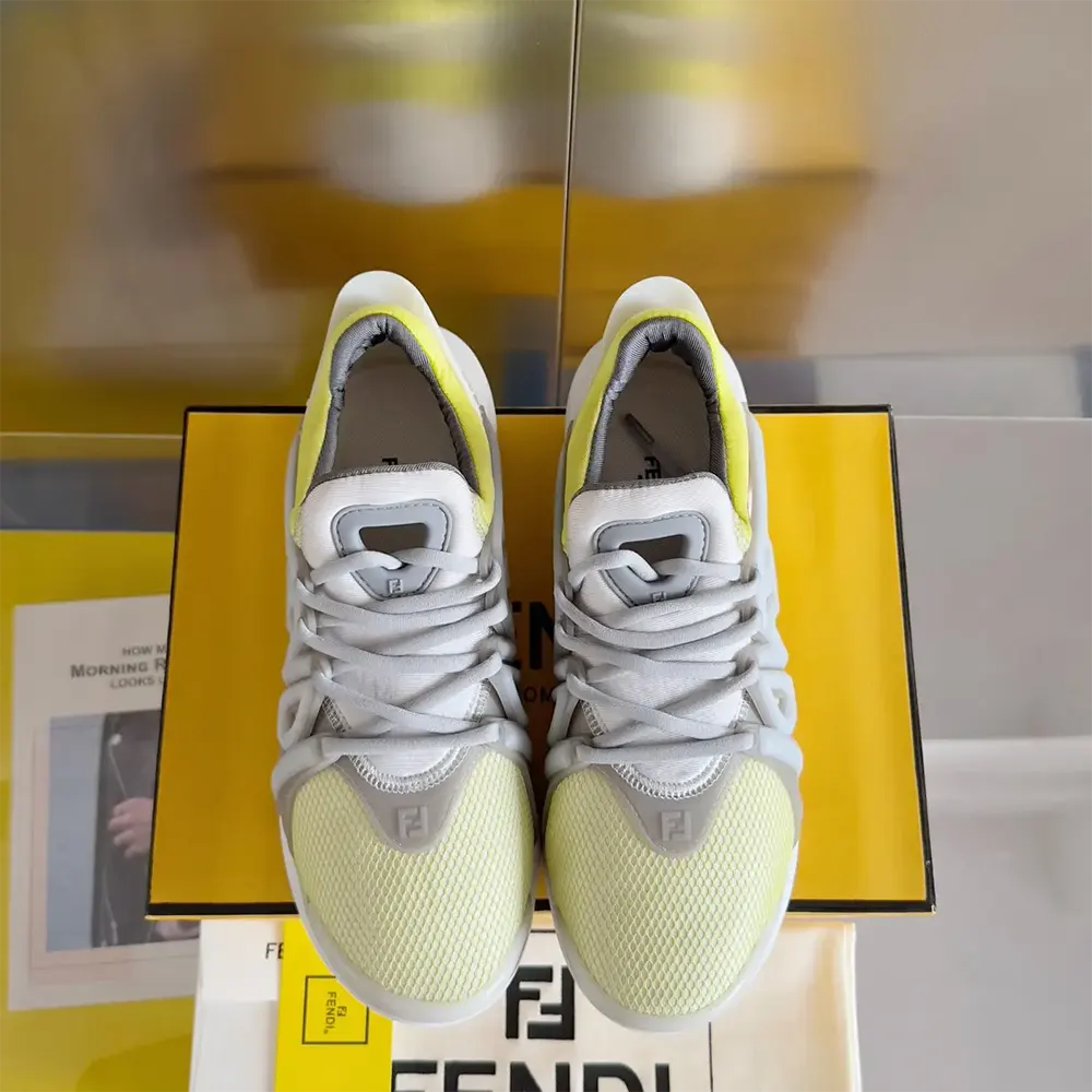 Top close-up showing laces and mesh detailing on Fendi Men Tag Sneakers