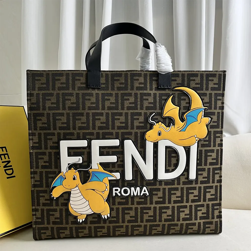 Close-up of signature logos on Fendi Unisex Shopper FENDI x FRGMT x POKÉMON Brown FF Fabric Bag