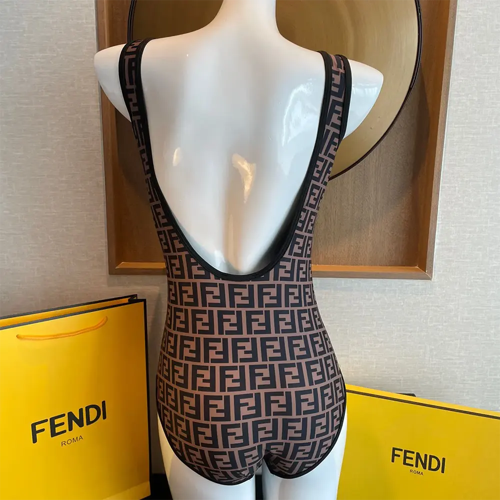 Side angle showing reversible feature of Fendi Women Brown Lycra® Reversible Swimsuit