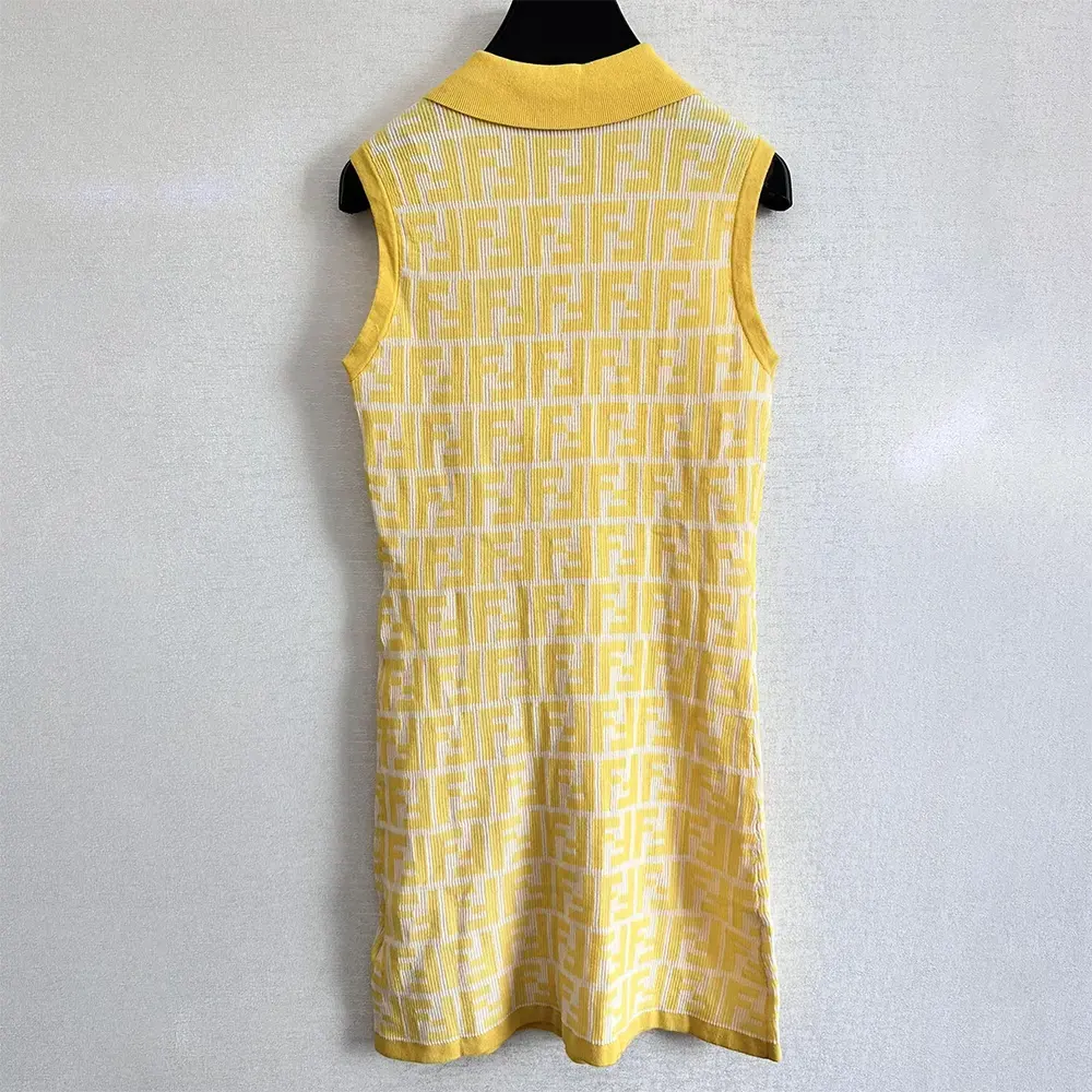Side angle showing silhouette of Fendi Women Golden Yellow FF Cotton Dress