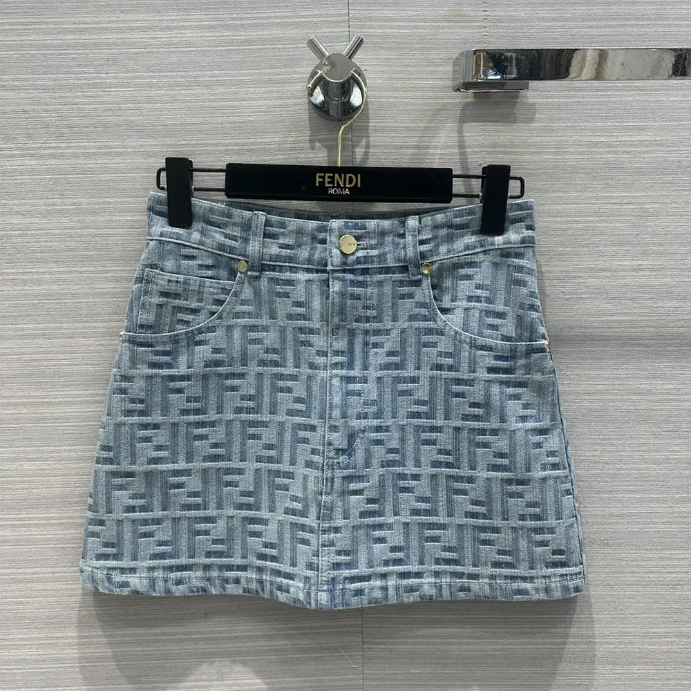 Close-up of subtle FF embroidery on Fendi denim skirt