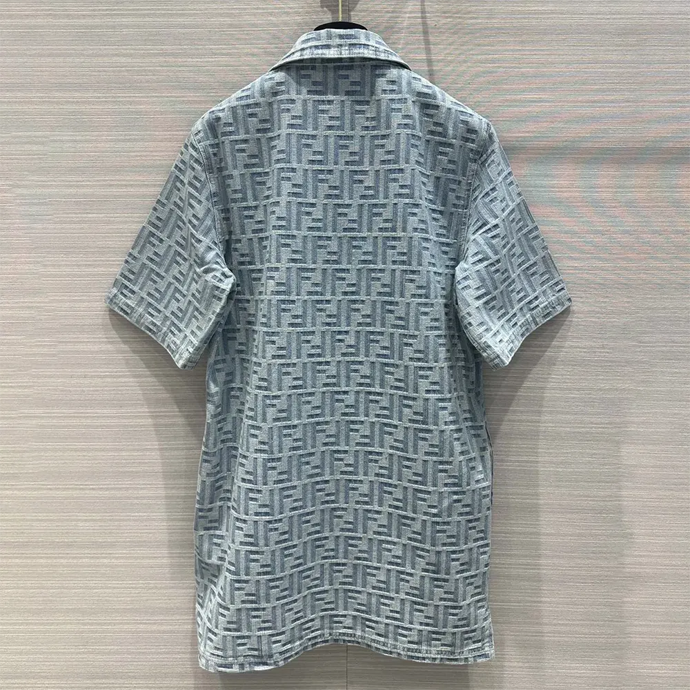 Side angle of Fendi Women Light Blue FF Denim Dress highlighting soft denim texture