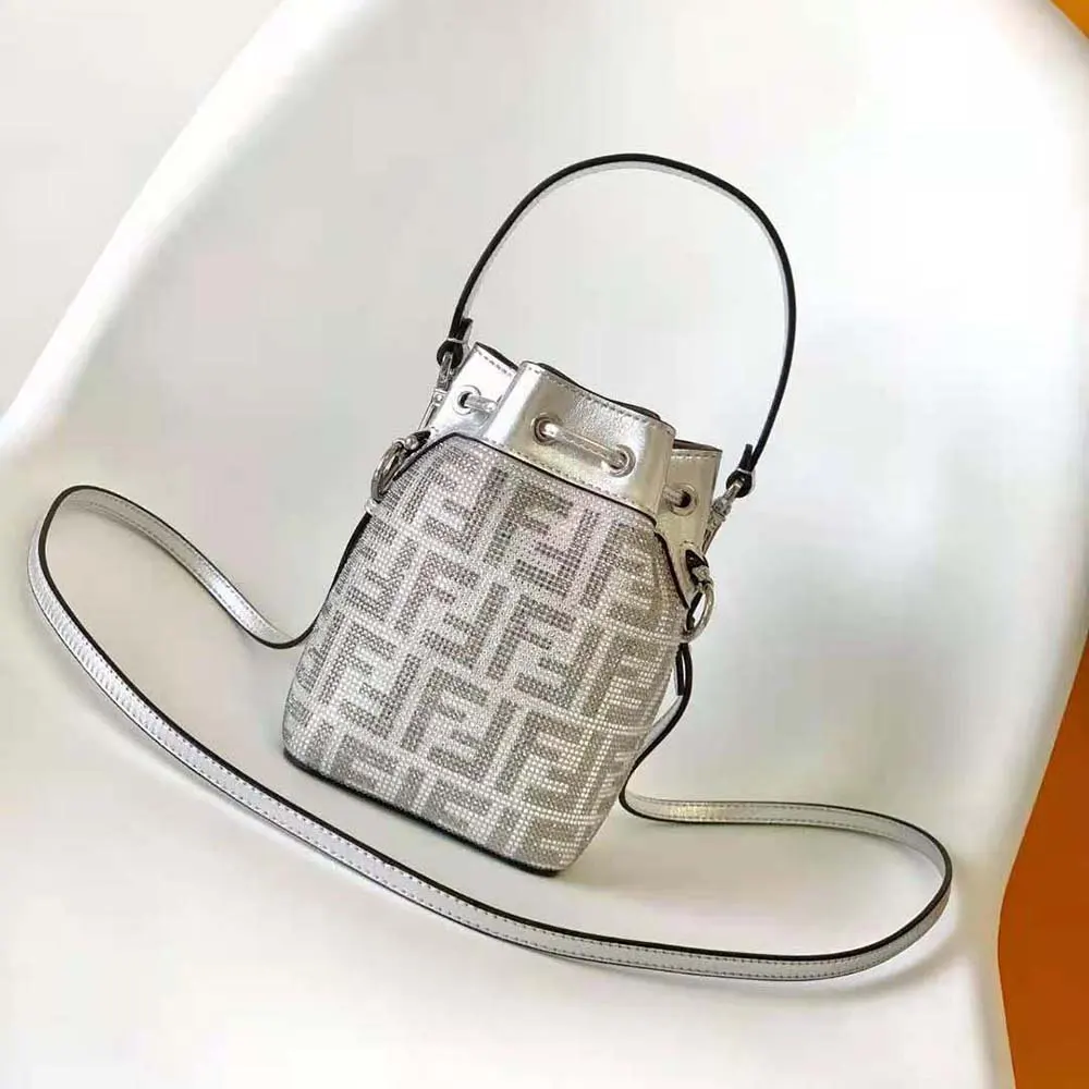 Close-up of crystal FF logo hardware on Fendi Women Mon Tresor Silver Leather Mini Bag