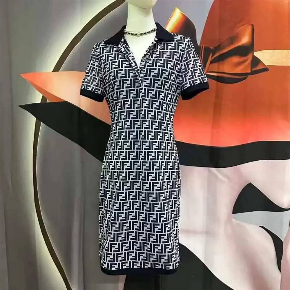 Side angle of Fendi Women Navy Blue FF Cotton Dress highlighting relaxed silhouette