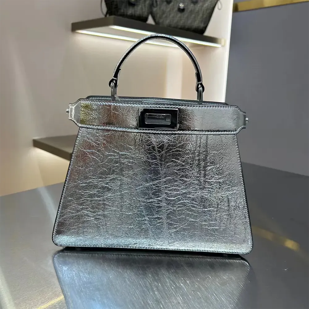 Close-up of padded nappa leather and signature ISeeU detail on Fendi bag