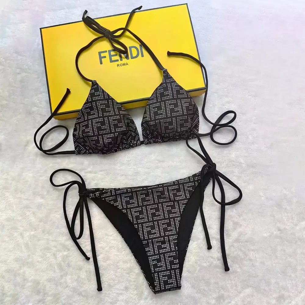 Close-up detail of gold-tone hardware on Fendi Women Swimsuit Black Tech Fabric Bikini