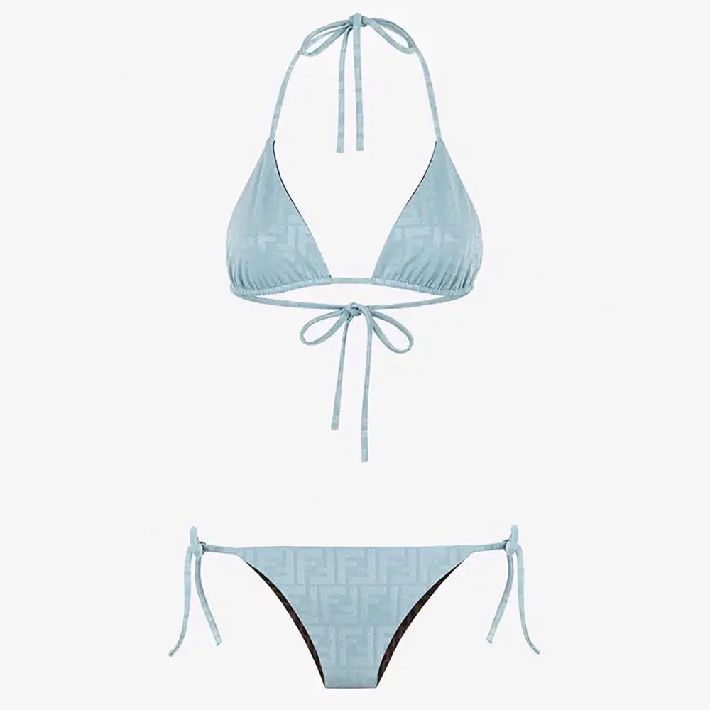 Front view of Fendi Women Swimsuit Blue Lycra Bikini on model