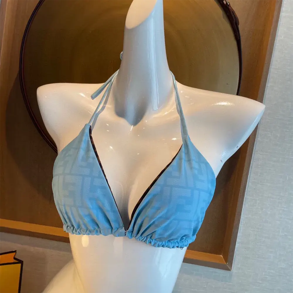 Side angle of Fendi Women Swimsuit Blue Lycra Bikini showing silhouette