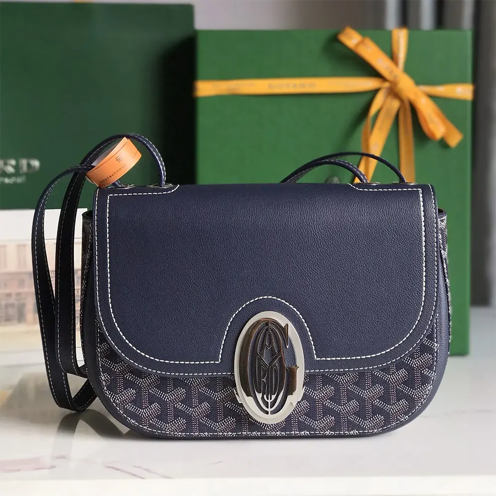 Close-up detail of Goyard logo and brass hardware on 233 Bag-Navy Blue