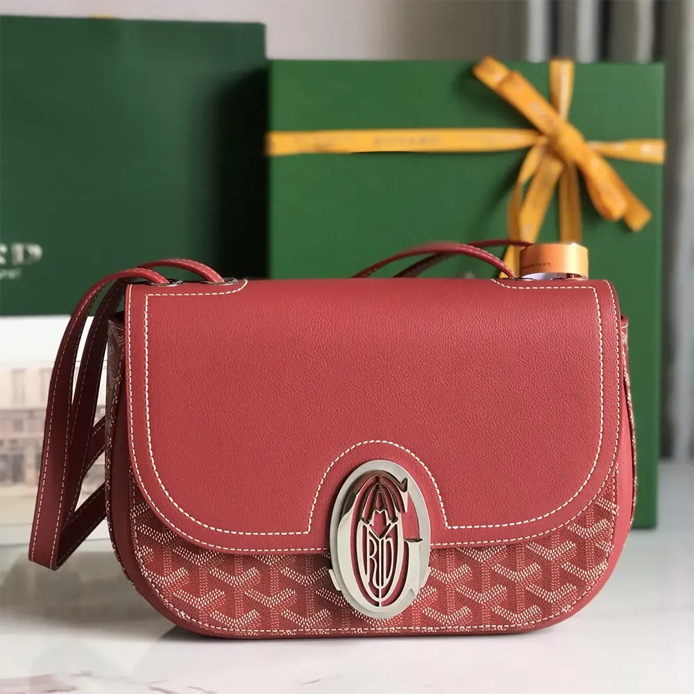 Close-up of red leather trim and brass zipper on Goyard Unisex 233 Bag-Red