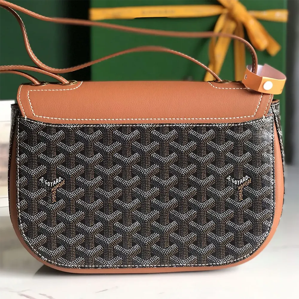 Side angle of Goyard Unisex 233 Bag-Tan with adjustable shoulder strap visible