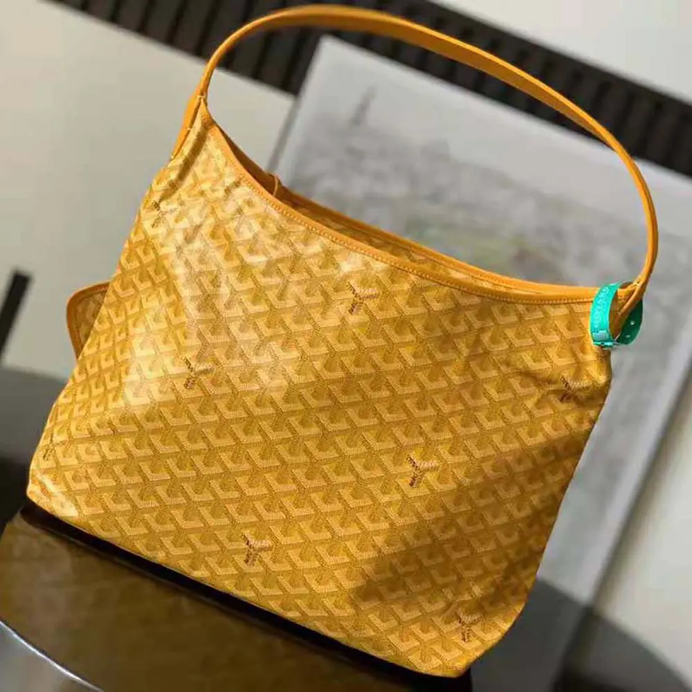 Interior shot of Goyard Unisex Bohème Hobo Bag-Yellow showing lining