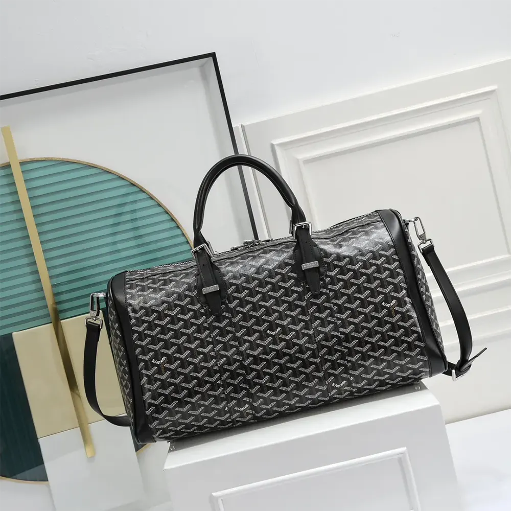 Side profile showing silver hardware and structured silhouette of Boston 50 Bag
