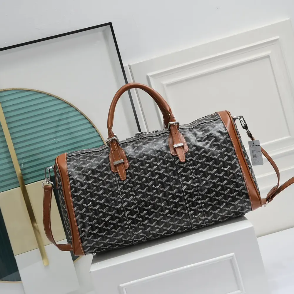 Side angle of Goyard Unisex Boston 50 Bag-Brown highlighting structured silhouette