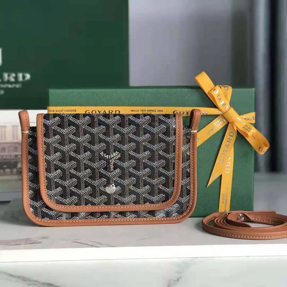 Close-up of polished brass hardware on Goyard Women Plumet Pocket Wallet-Brown
