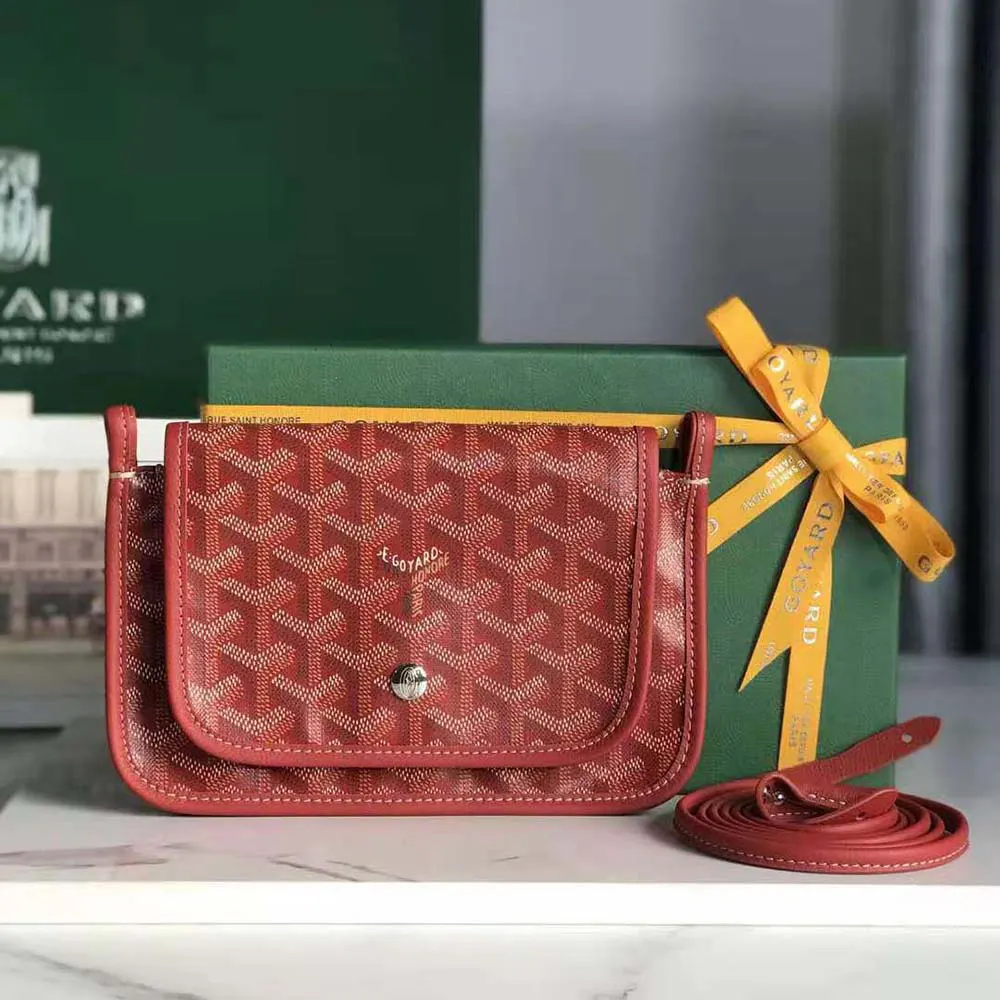 Close-up of gold-tone hardware and textured canvas on Goyard Women Plumet Pocket Wallet-Red