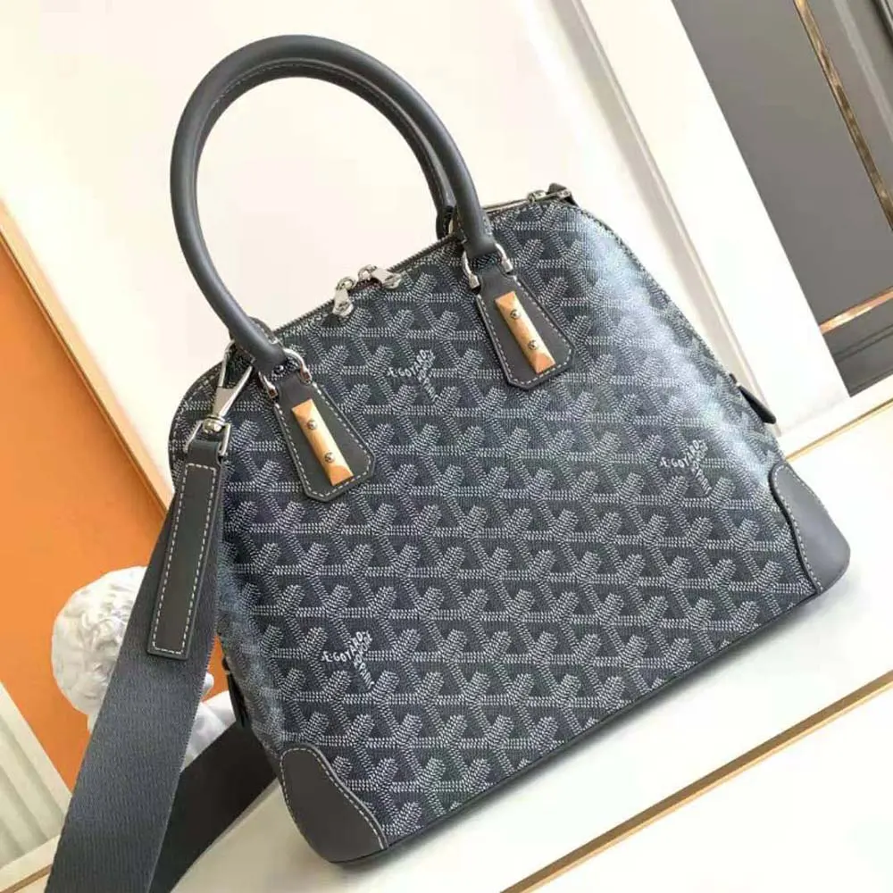 Side angle of grey Goyard Women Vendôme PM Bag highlighting silhouette