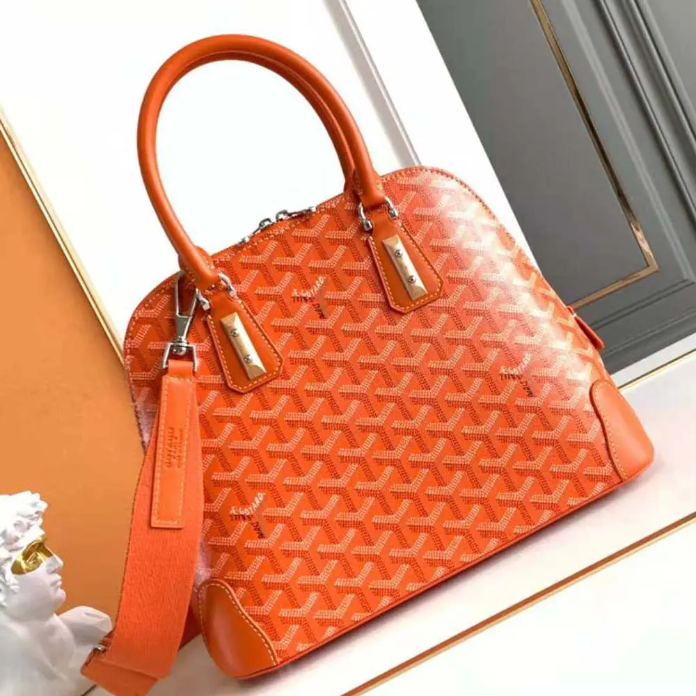 Close-up of Goyard Women Vendôme PM Bag-Orange signature chevron canvas