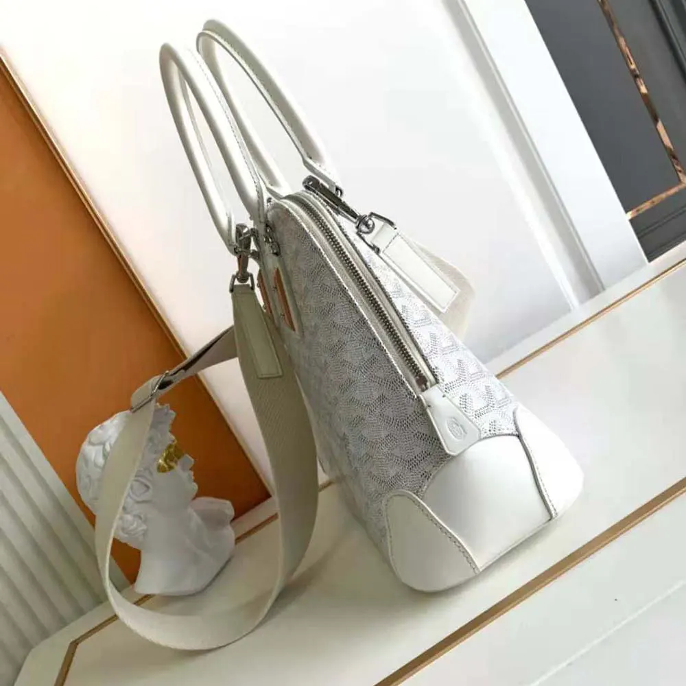 Side angle showcasing structured silhouette of Goyard Women Vendôme PM Bag-White