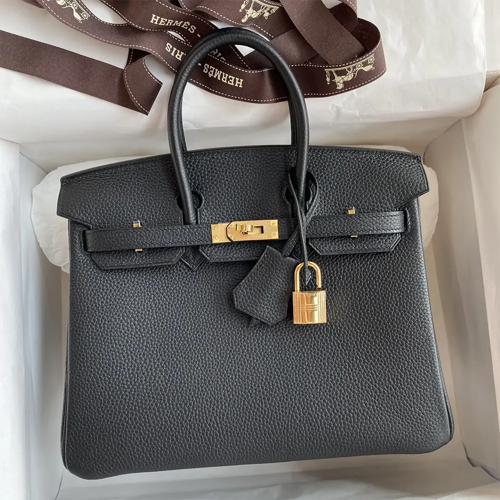 Close-up of gold lock and stitching on Hermes Birkin 30 Bag