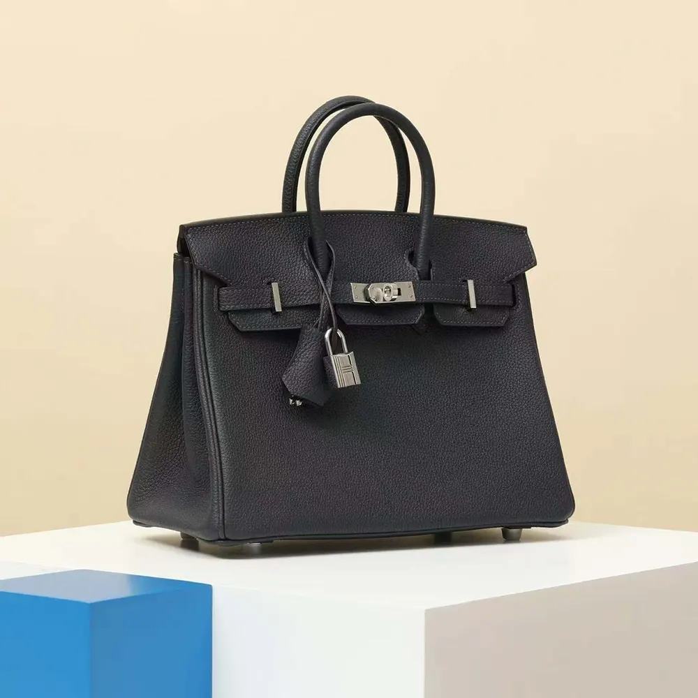 Side angle showing structured silhouette of Hermes Birkin 30 Bag Black