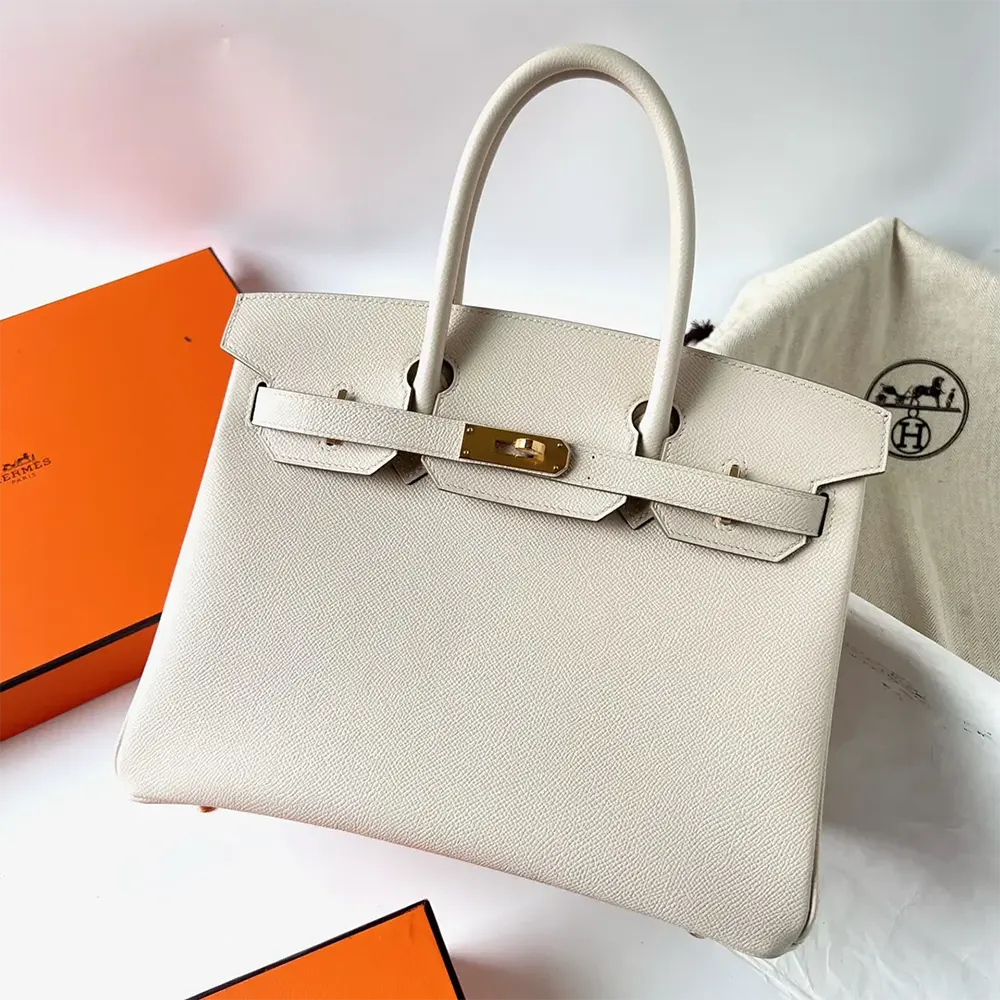 Close-up of gold hardware clasp on Hermes Birkin 30 Bag White/Gold