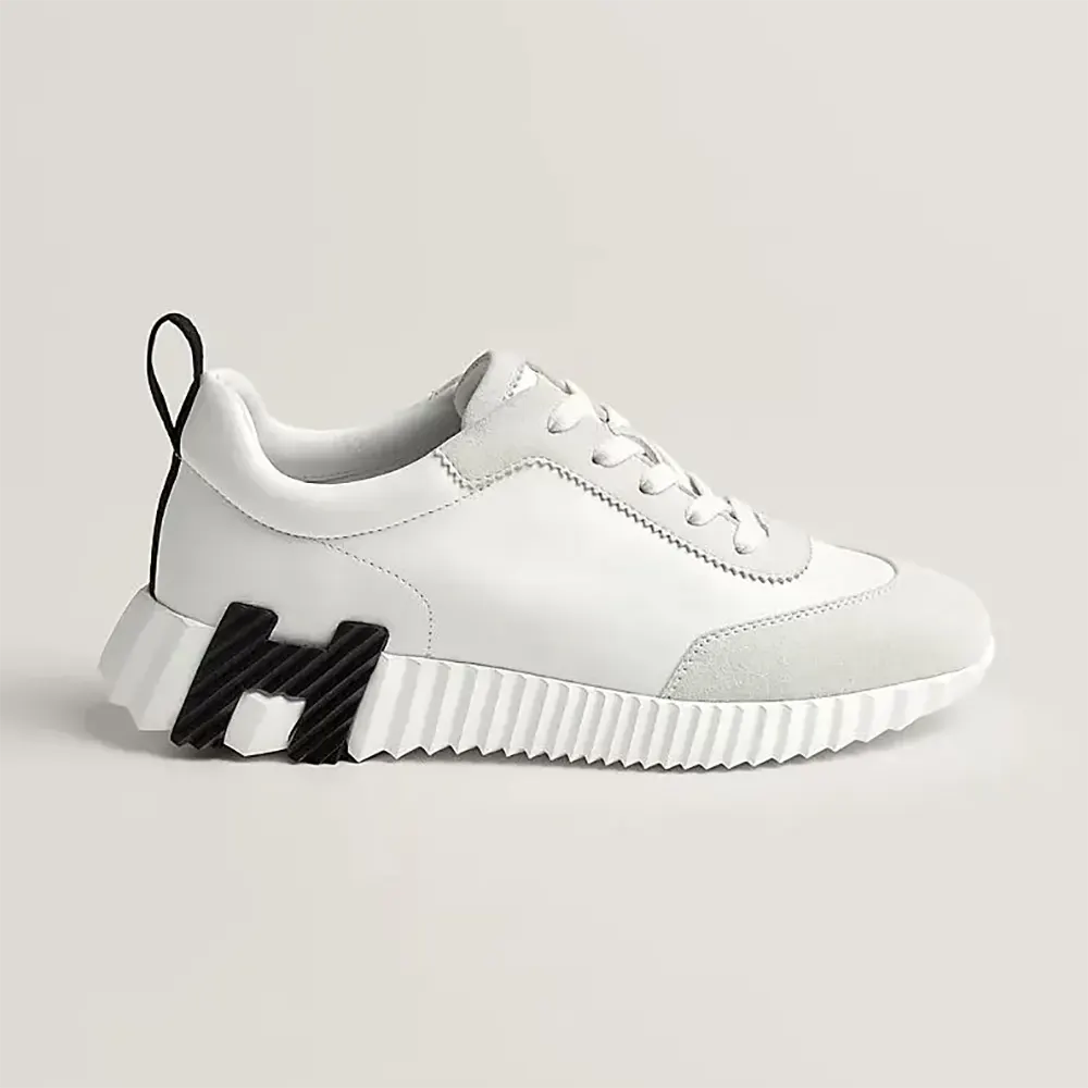 Side view of Hermes Unisex Bouncing Sneaker-White/Black sleek design