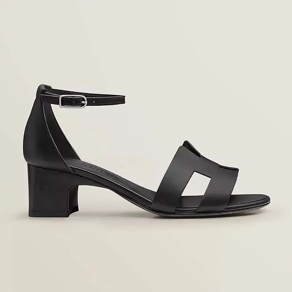 Side profile of Hermes Women Encens 50 Sandal-Black showing heel detail
