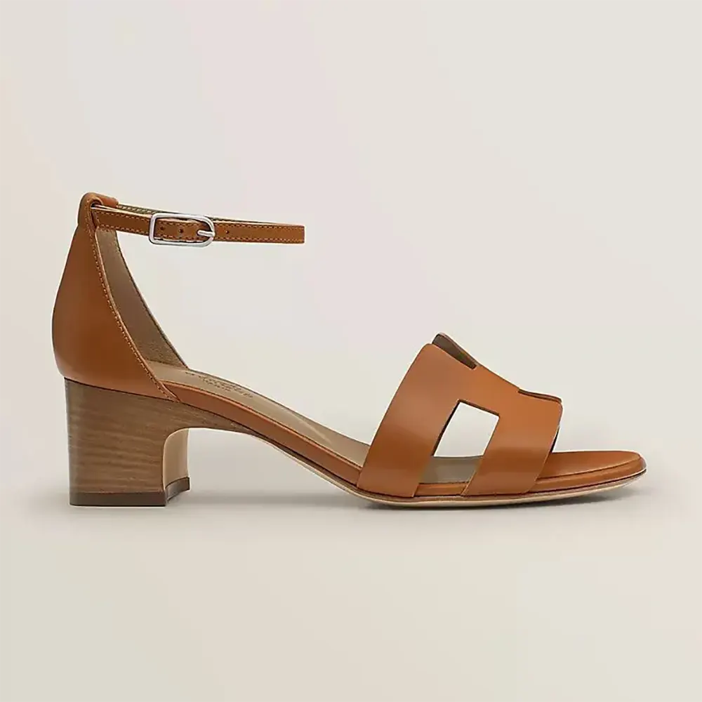Side view of Hermes Women Encens 50 Sandal-Brown showing heel and buckle