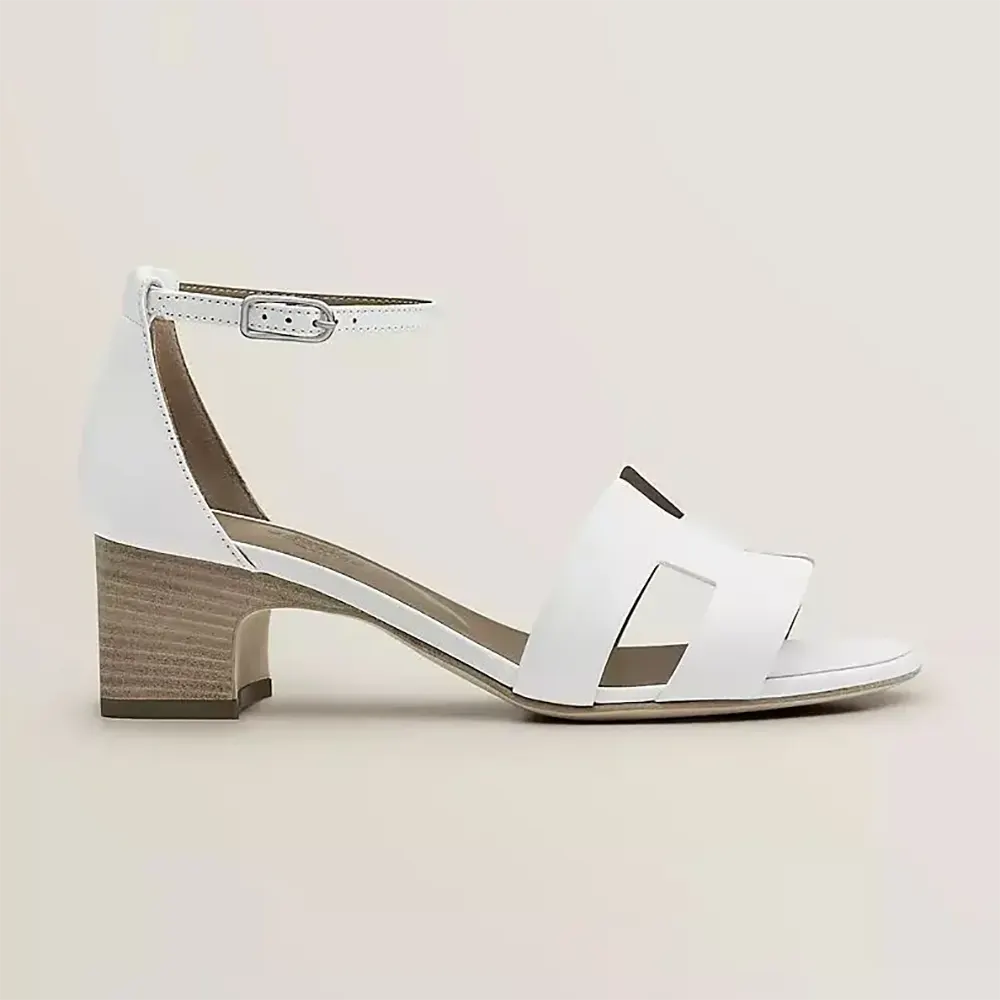 Side profile of Hermes Women Encens 50 Sandal-White showing heel height