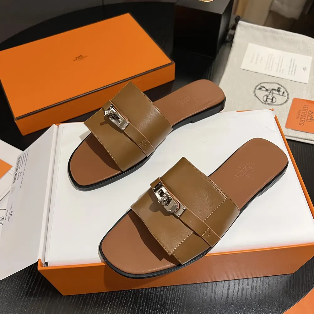 Top view of Hermes Women Giulia Sandal-Brown highlighting buckle closure