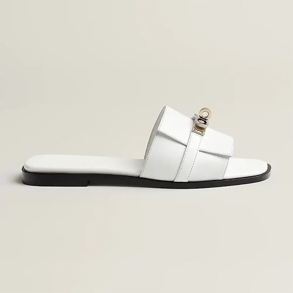 Side profile of Hermes Women Giulia Sandal-White showcasing sleek straps