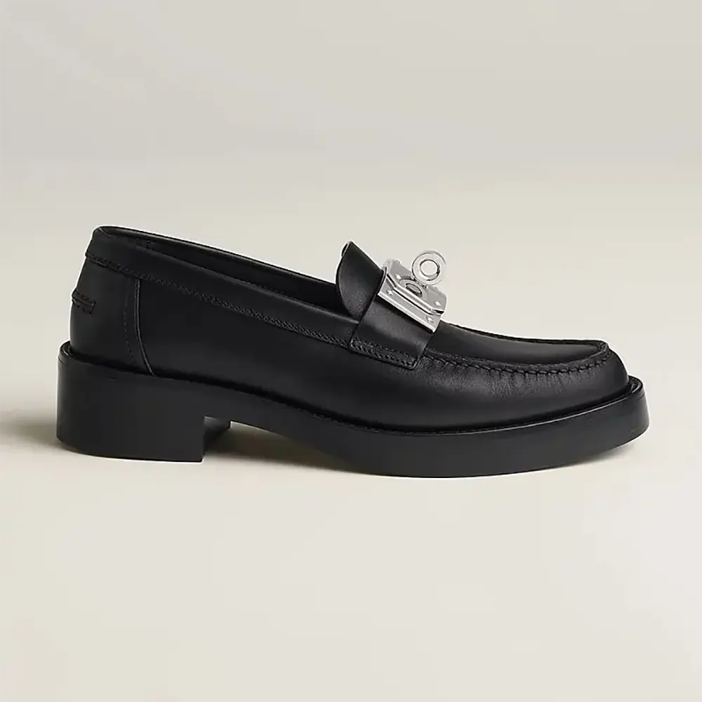 Side profile of Hermes Women Hot Loafer-Black showing sleek silhouette