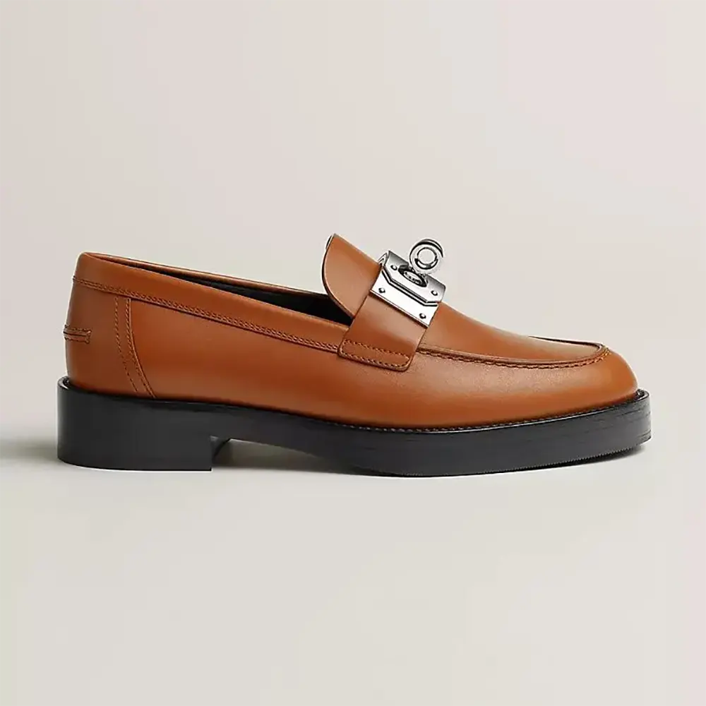 Side view of Hermes Women Hot Loafer-Brown showing leather texture