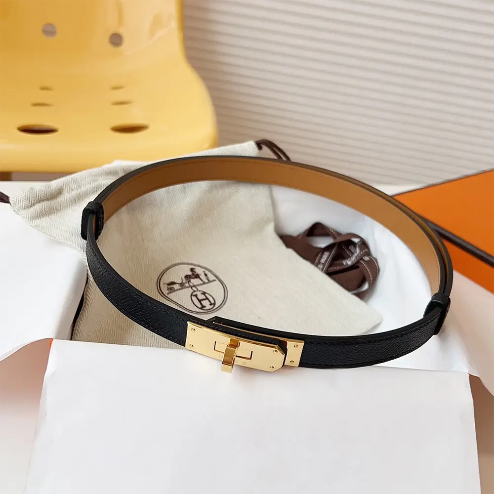 Close-up of gold-tone Hermes buckle on black Kelly 18 Belt