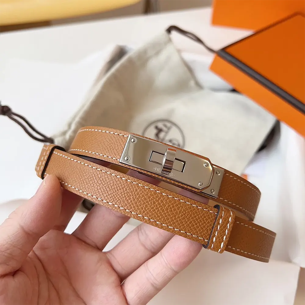 Side profile showing slim silhouette of Hermes Women Kelly 18 Belt-Brown