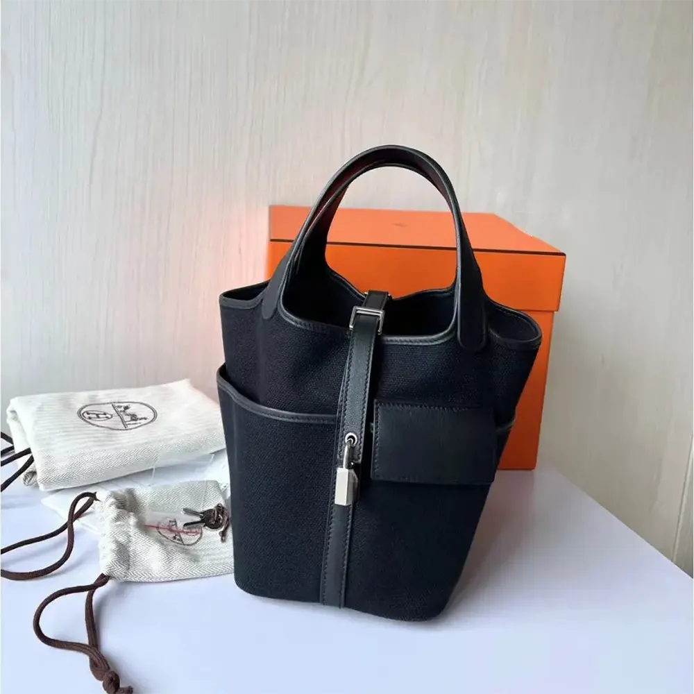 Close-up of polished silver lock hardware on Hermes Women Picotin Lock bag