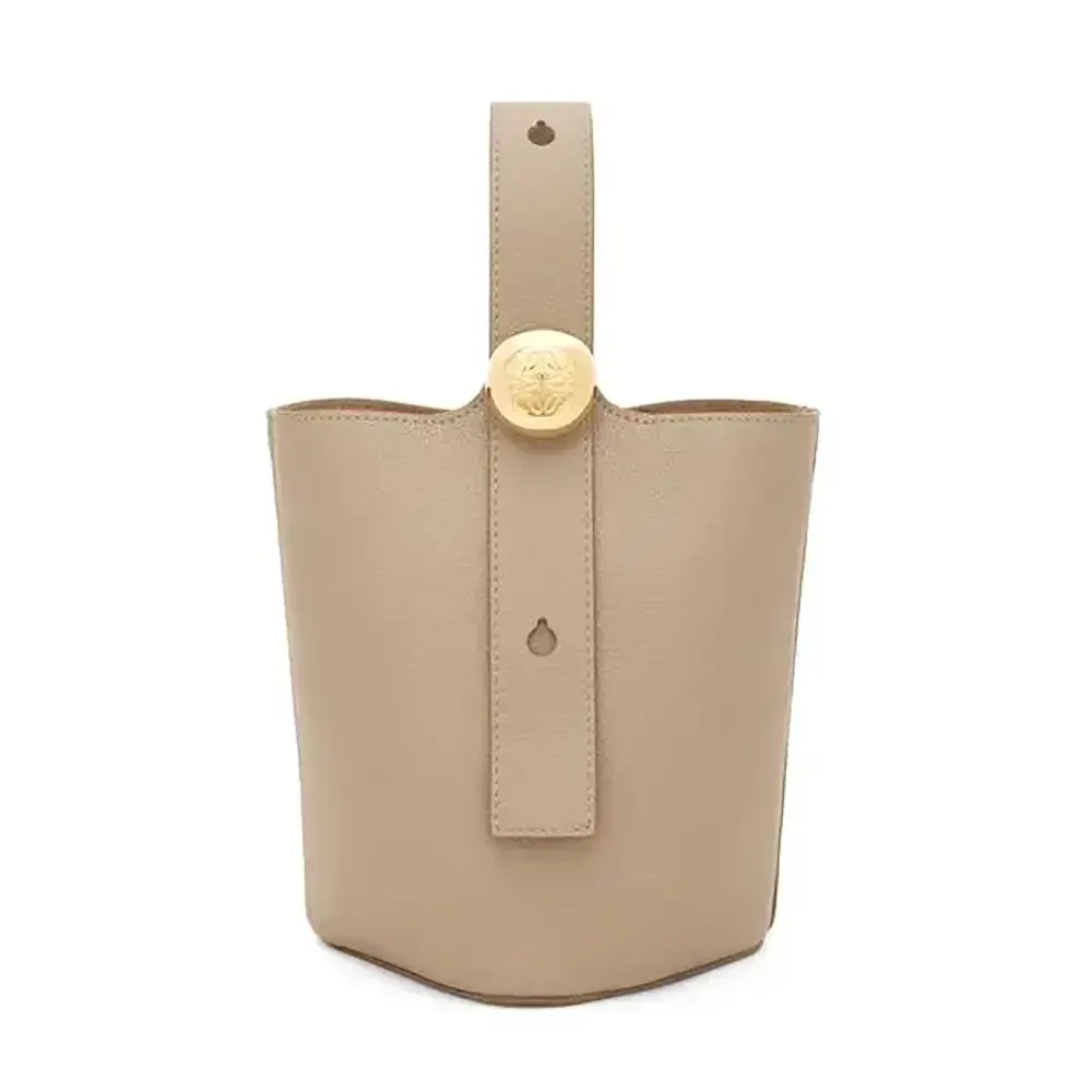 Front view of Loewe Unisex Mini Pebble Bucket Bag in sandy calfskin