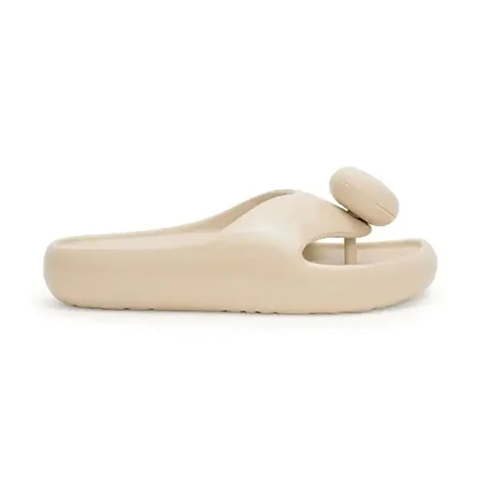 Side profile of Loewe Women Foam Pebble Sandal-White showing sculpted foam sole