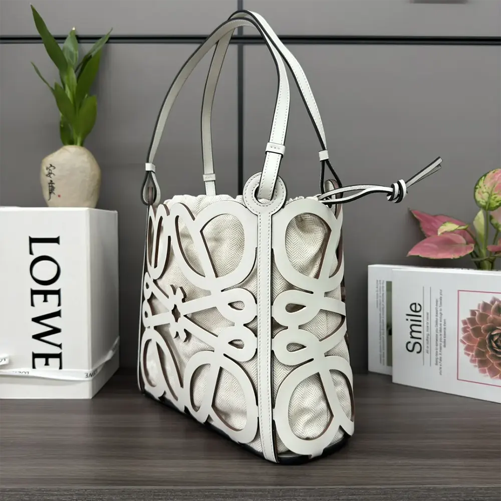 Side profile showing silhouette of Loewe Women Small Anagram Cut-out Tote