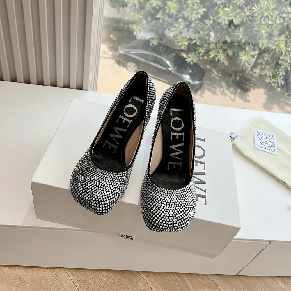 Back angle showcasing heel and leather lining on Loewe Women Toy Pump