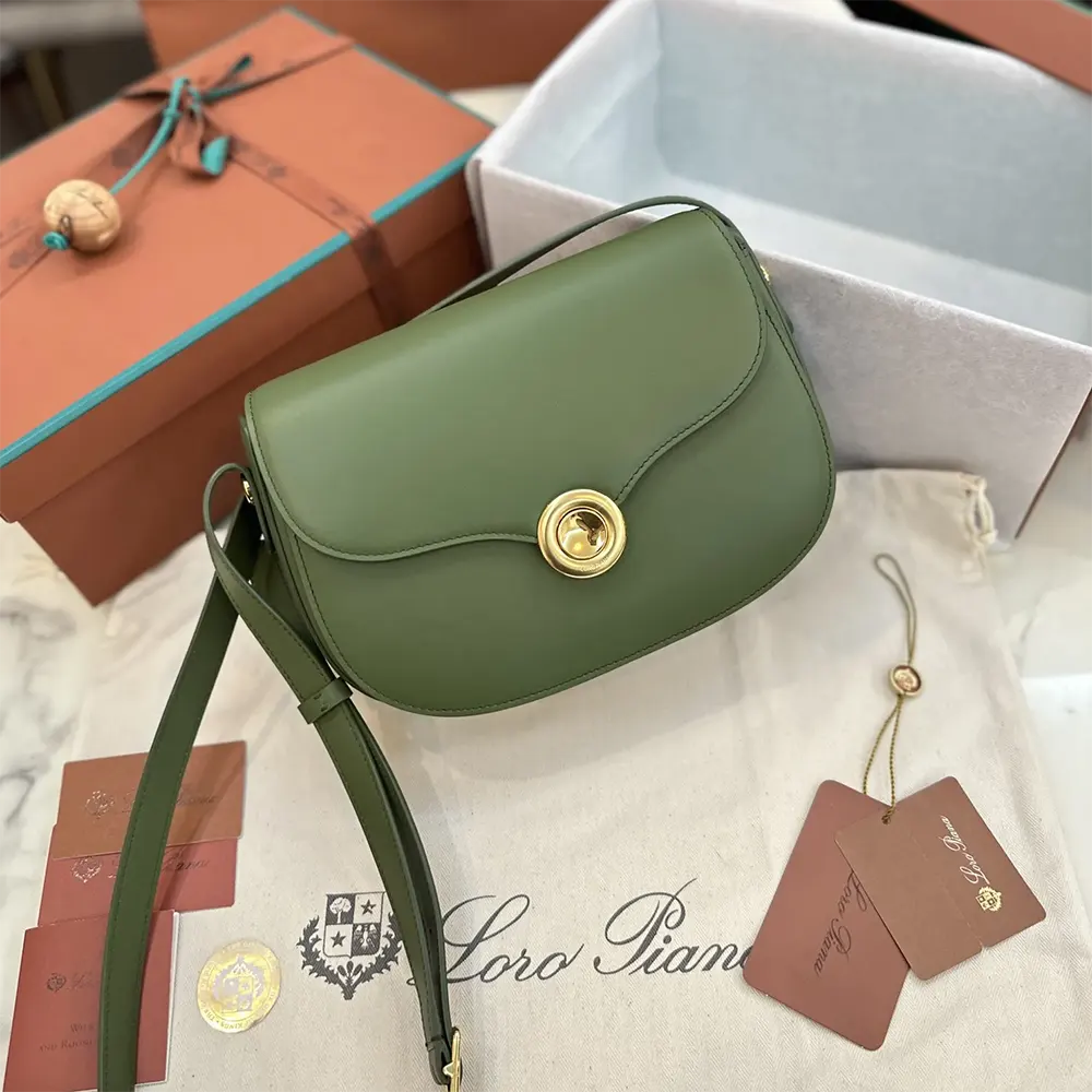 Side profile showing compact silhouette of Loro Piana Women Mini Ghiera Bag-Dark Green