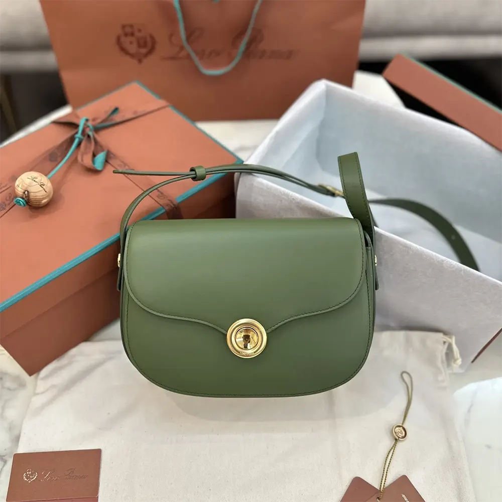Close-up of polished ghiera closure on Loro Piana Women Mini Ghiera Bag-Dark Green