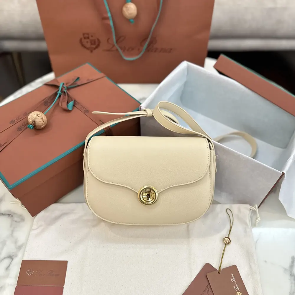 Close-up of polished Ghiera clasp on Loro Piana Mini Ghiera Bag-White
